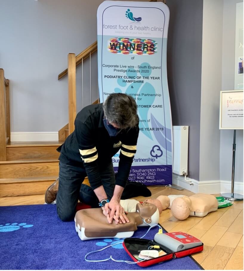Forest foot and health clinic undergoing CPR training