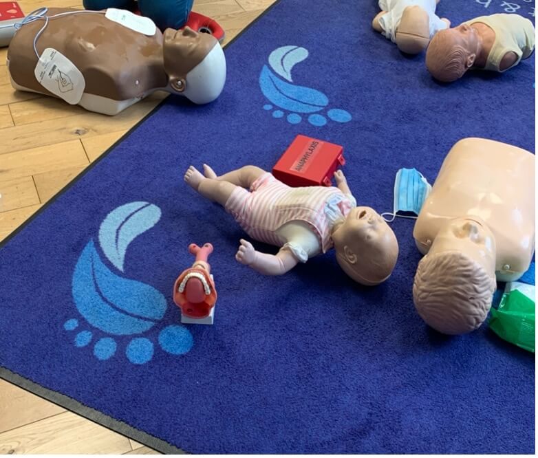 Staff at forest foot and health clinic undergoing CPR training